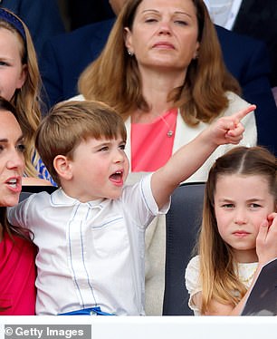 Louis spots something exciting on stage during the 2022 Platinum Pageant