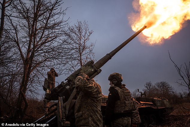 Ukrainian soldiers of 43rd Brigade are seen working on a Soviet era Pion self propelled howitzer in the direction of Chasiv Yar, Ukraine on January 27, 2025