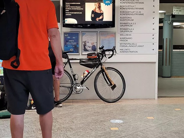 The man's bicycle is pictured above with an axe attached to the frame. The axe appears to be different to the one found in the pensioner's apartment