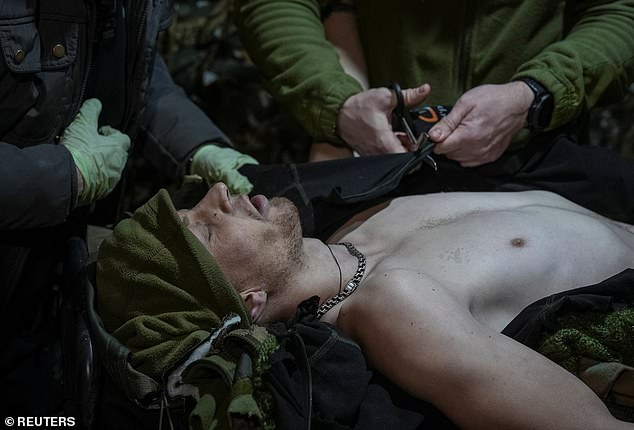Combat medics of the 14th Assault Brigade Chervona Kalyna of the Ukrainian National Guard treat an injured Ukrainian serviceman inside a medical stabilization point, amid Russia's attack on Ukraine, near the frontline town of Pokrovsk in Donetsk region, Ukraine February 3, 2025