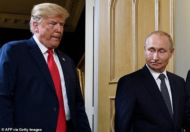 Donald Trump and President Vladimir Putin arrive for a meeting in Helsinki in July 2018