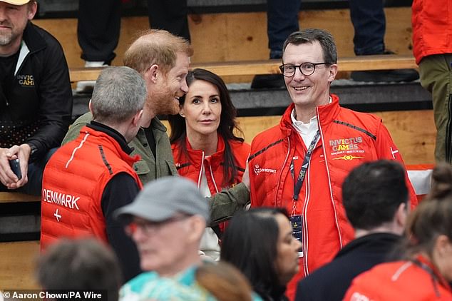 The Duke of Sussex with Prince Joachim (right) and Princess Marie of Denmark watching the volleyball at Vancouver Convention Centre (VCC)