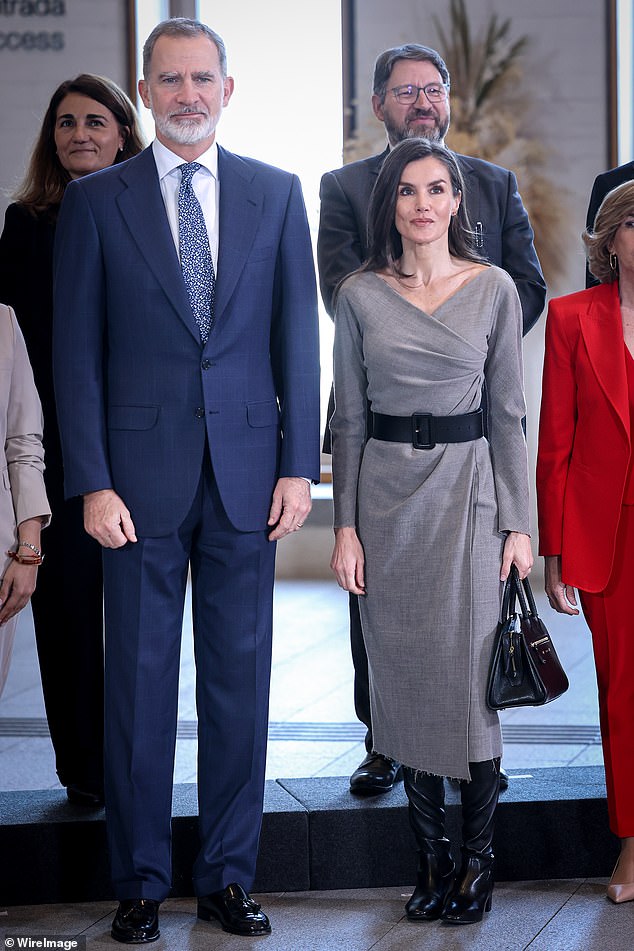 The royal had her thick chocolate tresses perfectly blow-dried to create a fresh and glossy look