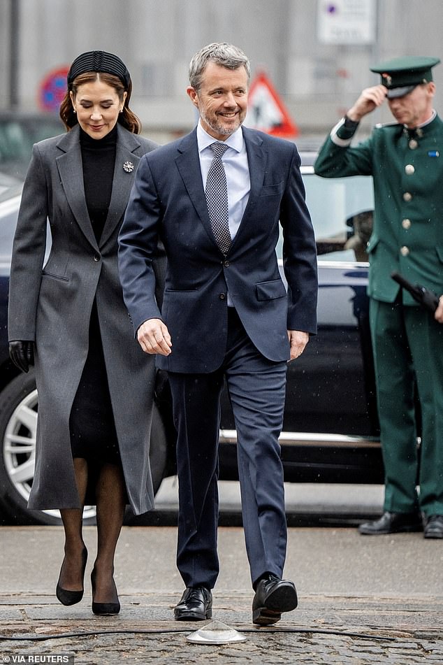 Queen Mary, 53, looked typically elegant in a full-length, grey coat while King Frederik X was dapper in a navy suit