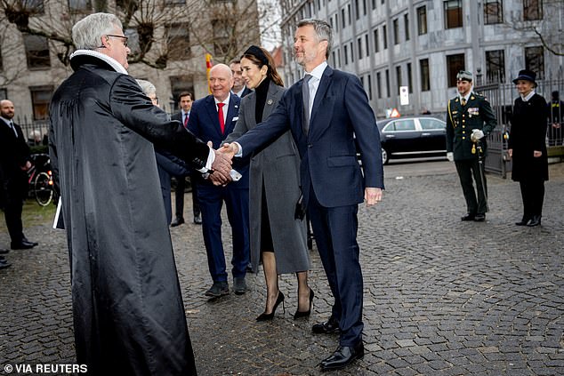Frederik was pictured shaking hands with the priest of The Church of Holmen in Copenhagen today