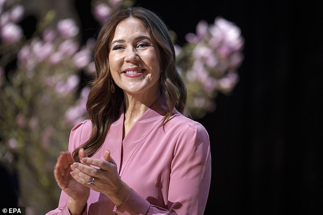 The royal, 52, appeared in good spirits on Tuesday as she slipped into an elegant pink and crimson ensemble to presents the Ministry of Education and Research's EliteForsk awards in her native Denmark's capital