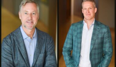 A composite shot of ArcLight Founder Dan Revers and Partner Lucius Taylor, both smiling and wearing stylish blue suits
