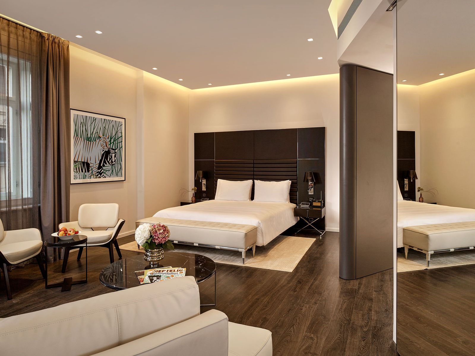 Image may contain Home Decor Chair Furniture Corner Art Painting Couch Bed Indoors Interior Design Plate and Desk