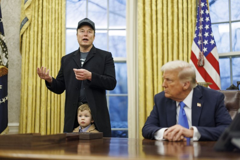Elon Musk appears with his son X and President Donald Trump in the Oval Office of the White House on Feb. 11Photo by Aaron Schwartz/UPI