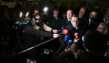 France's Minister of the Interior Bruno Retailleau (Centre R) addresses the press following a knife attack in Mulhouse. (Photo by AFP)