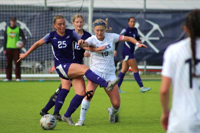 Colorado School of Mines senior Reese McDermott (19) vies for possession during the Nov. 3 Senior Day game versus Westminster
