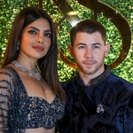 Indian actress and producer Priyanka Chopra Jonas, along with her husband, American singer and actor Nick Jonas, poses for a photograph at her brother Siddharth Chopra's and his fiancée actress Neelam Upadhyaya's Sangeet ceremony, a pre-wedding celebration, in Mumbai on February 6, 2025. (Photo by Sujit JAISWAL / AFP)
