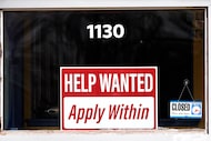 FILE - A "help wanted" sign is seen at an Allstate insurance office in Elgin, Ill., March...