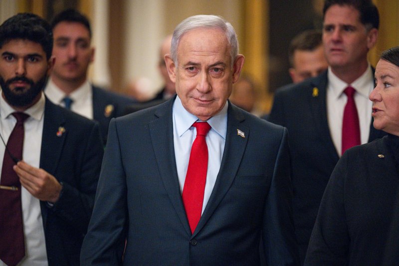Israeli Prime Minister Benjamin Netanyahu walks to a meeting in the U.S. Capitol on Thursday to discuss how to ensure lasting peace while rebuilding Gaza. Photo by Annabelle Gordon/UPI
