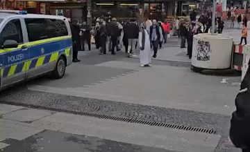 A peaceful German citizen praying in the middle of the street. What a beautiful country