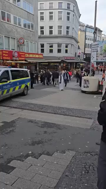 A peaceful German citizen praying in the middle of the street. What a beautiful country