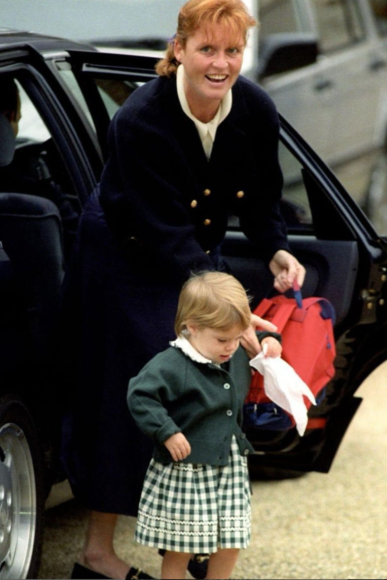 Image may contain Sarah Duchess of York Clothing Skirt Coat Face Head Person Photography Portrait and Child