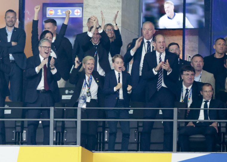 BERLIN, GERMANY - JULY 14: UK Prime Minister Keir Starmer, FA Chair Debbie Hewitt, Prince George of Wales, Prince William, Prince of Wales celebrate the goal for England, UEFA General-Secretary Theodore Theodoridis, UEFA President Aleksander Ceferin during the UEFA EURO 2024 final match between Spain and England at Olympiastadion on July 14, 2024 in Berlin, Germany. (Photo by Jean Catuffe/Getty Images)