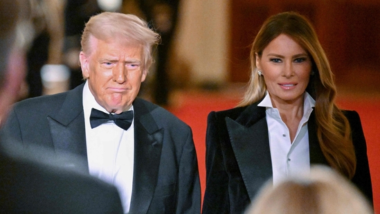 First Lady Melania Trump and President Donald Trump arrive for the National Governors Association Evening Dinner and Reception in the East Room of the White House in Washington, DC, on February 22, 2025. (Photo by ROBERTO SCHMIDT / AFP)(AFP)