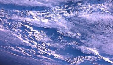 white clouds on a blue background