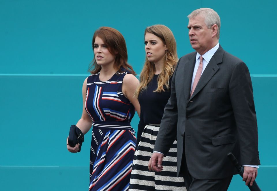 Princess Eugenie, Princess Beatrice, and Prince Andrew leaving Buckingham Palace.
