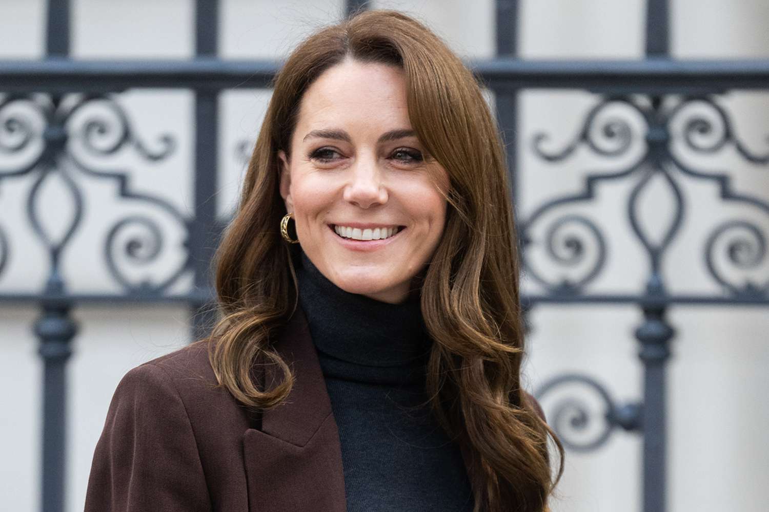 Kate Middleton Holds Hands with Young Girl Who Refuses to Let Go