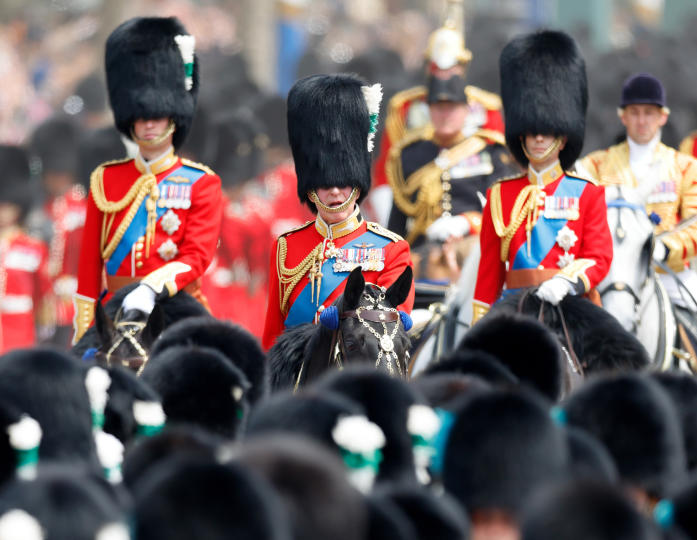 King Charles [center] rides a horse at Trooping the Colour on June 17, 2023
