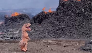 Person Brought Dino Suit to Iceland for This Moment