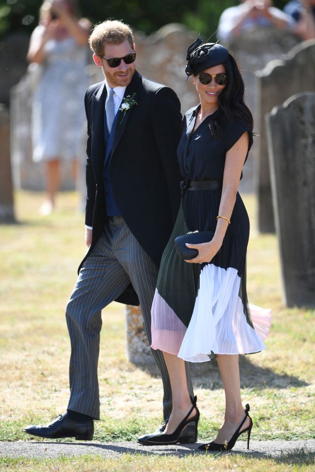 Prince Harry and Meghan Markle at a wedding.