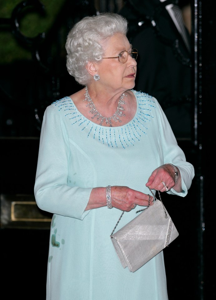 Queen Elizabeth II at King Constantine of Greece's 70th birthday party.