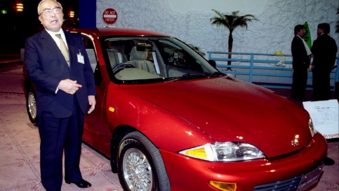 Toyota Motor Corporation’s honorary chairman Eiji Toyoda introduces a Toyota Cavalier compact car