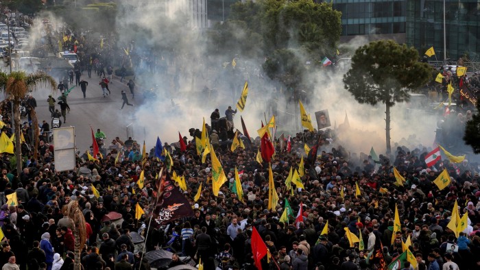 Hizbollah supporters clash with the Lebanese army after blocking the road to Beirut International airport on Saturday
