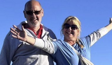Man found dead alongside his wife was acting 'very different and worried' neighbours claim, as police say his mobile phone contains 'vital clues'
