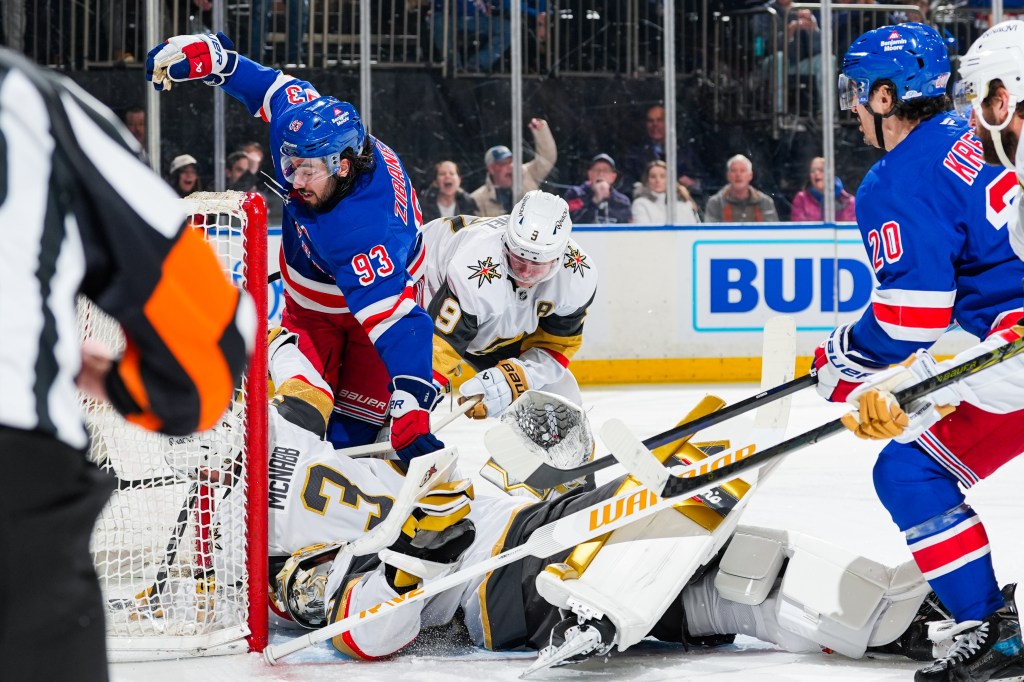 Mika Zibanejad #93 of the New York Rangers jams the puck into the net for a goal in the third period against the Vegas Golden Knights at Madison Square Garden on February 2, 2025 in New York City.