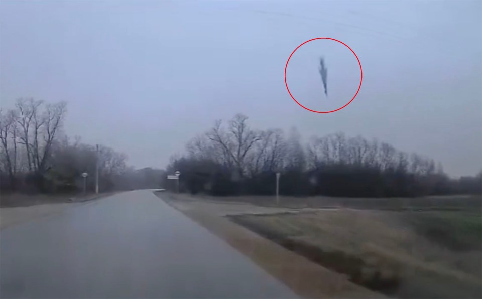 Dashcam footage of a missile falling from the sky.
