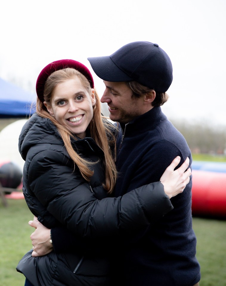 Princess Beatrice and Edoardo Mapelli Mozzi embracing.