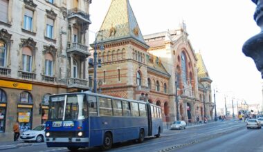 Budapest, Hungary - picture of a bus driving past historic old buildings