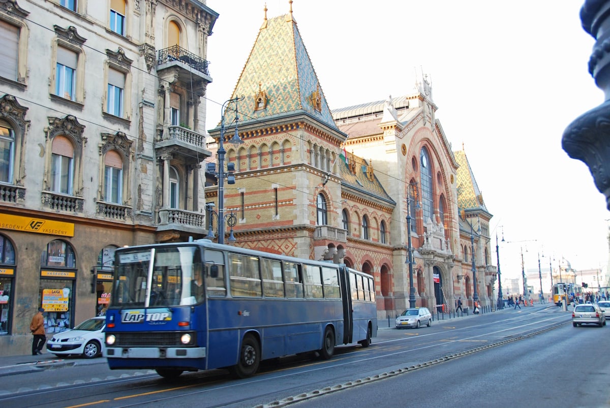 Budapest, Hungary - picture of a bus driving past historic old buildings