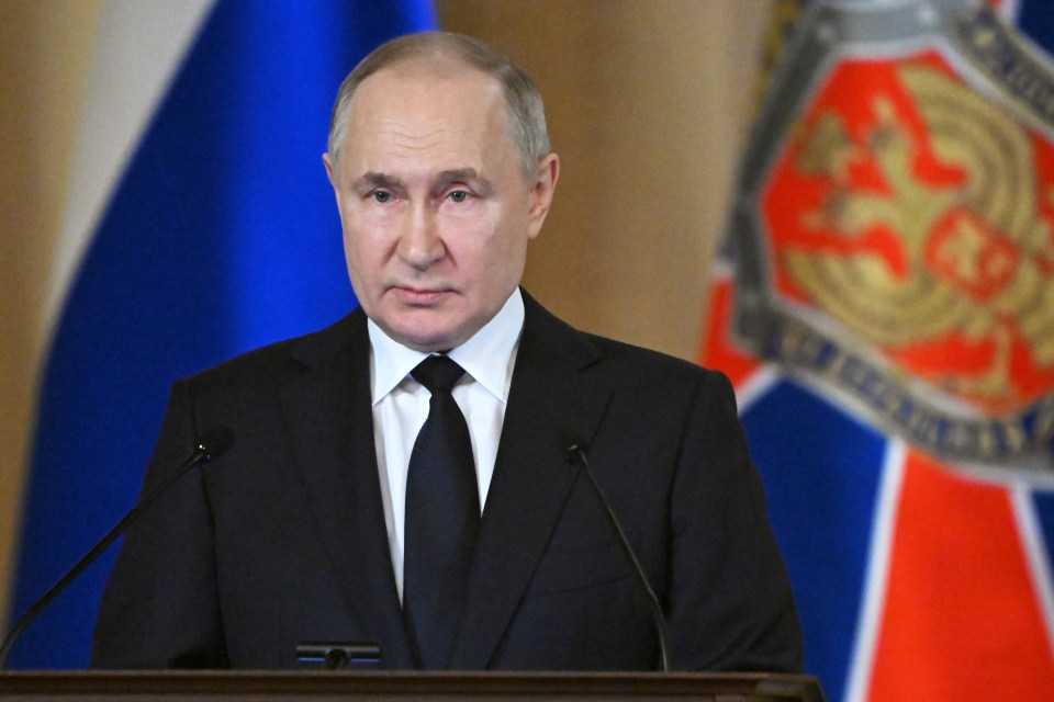 Vladimir Putin speaking at a meeting.