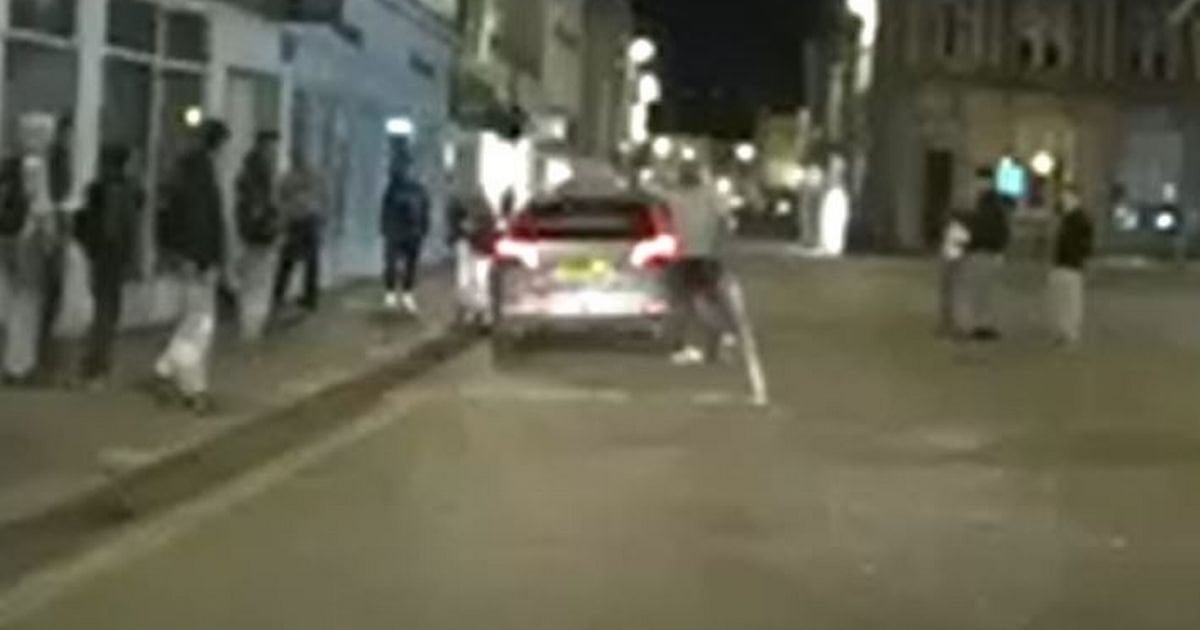 Taxi driver who 'drove at teens' called a hero as wife says 'I'm proud'