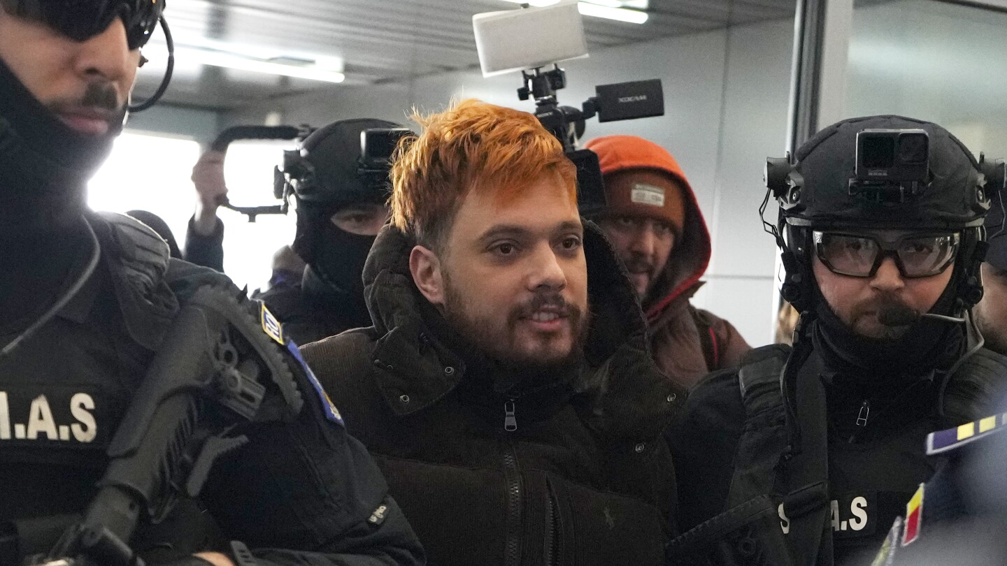 French fugitive 'The Fly' is being extradited from Romania to France, official says
