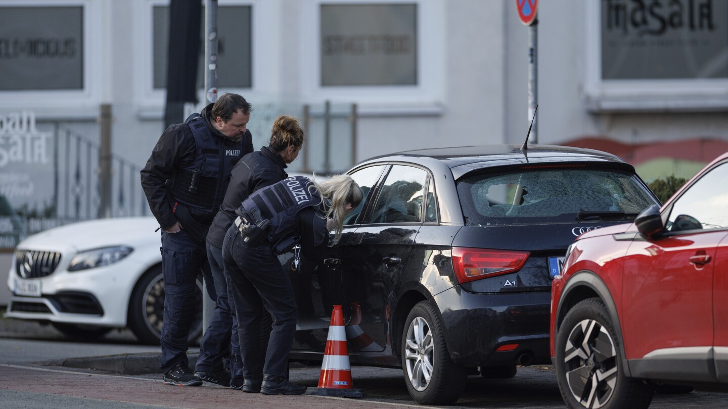 4 people hurt as shots are fired near a courthouse in western Germany