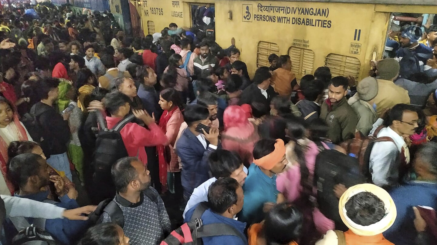 At least 18 people dead after stampede at New Delhi railway station