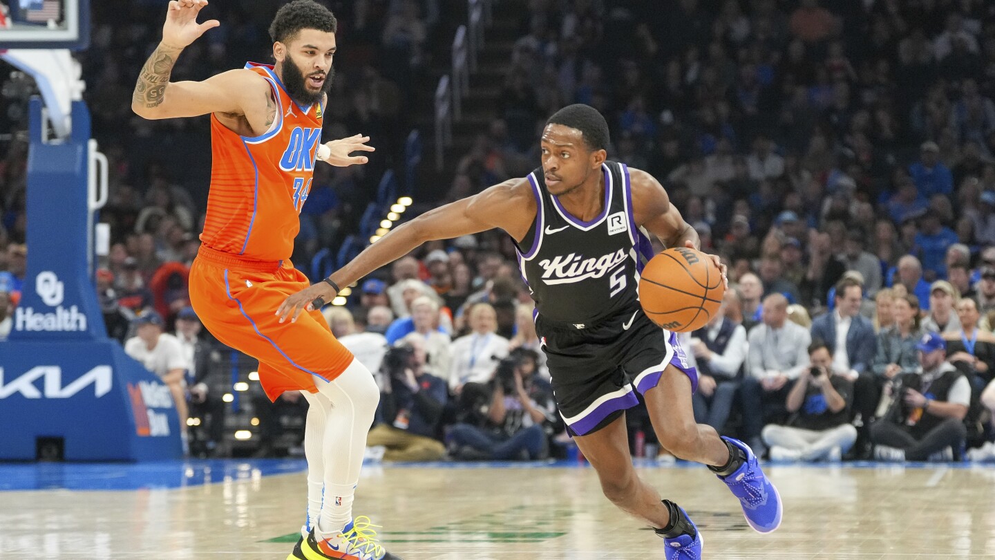 De'Aaron Fox will join Victor Wembanyama in San Antonio as part of a 3-team trade, AP sources say