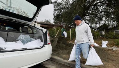 Race to protect homes, residents in burn zones as major rainstorm slams into L.A.
