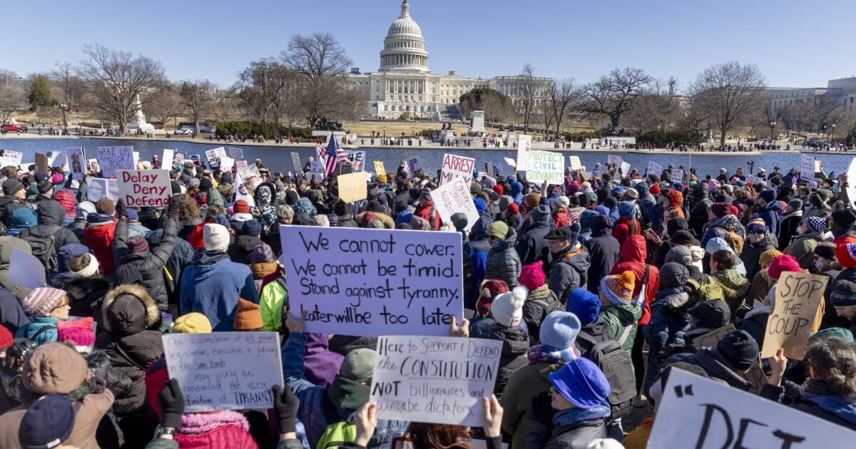 Thousands of people protest in Washington, D.C., and across the U.S. on Presidents Day