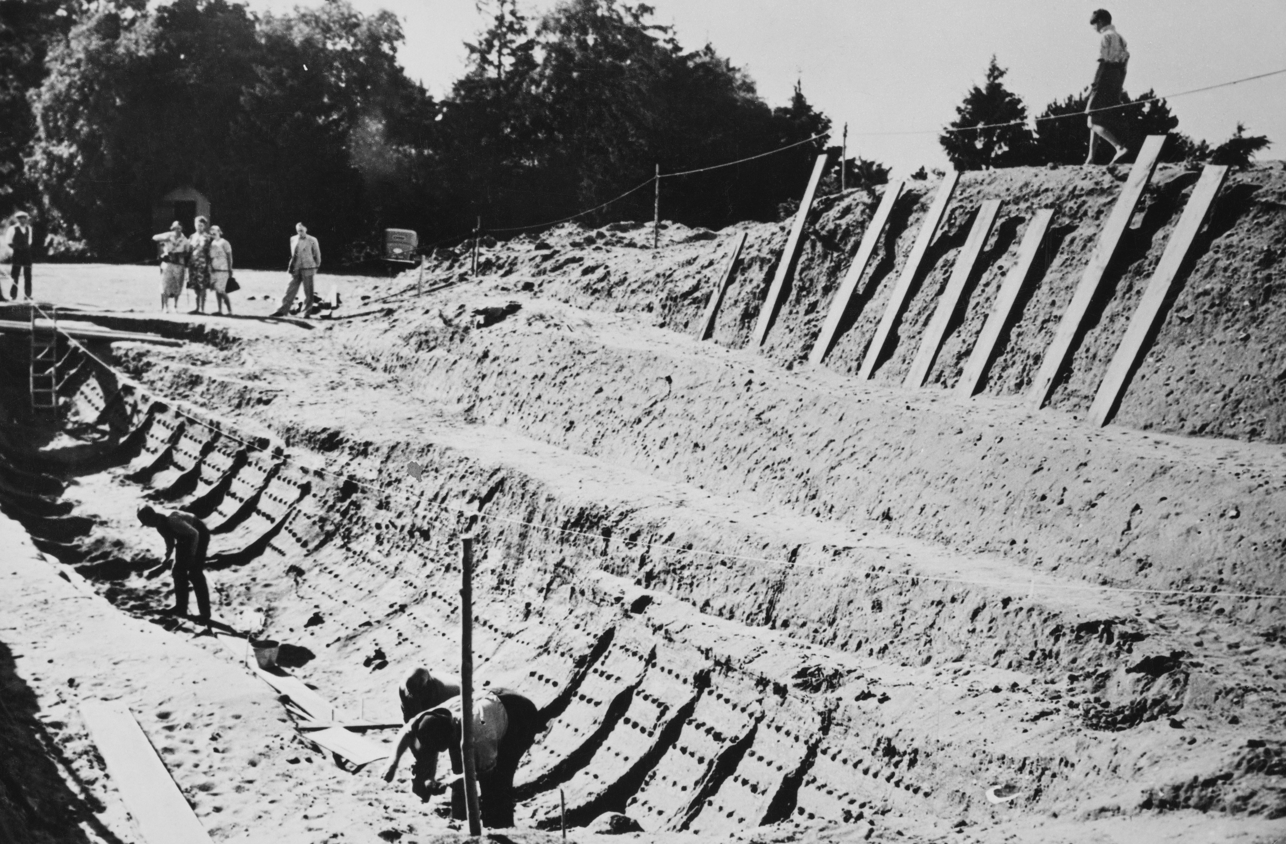 Black and white photo of the Sutton Hoo excavations.