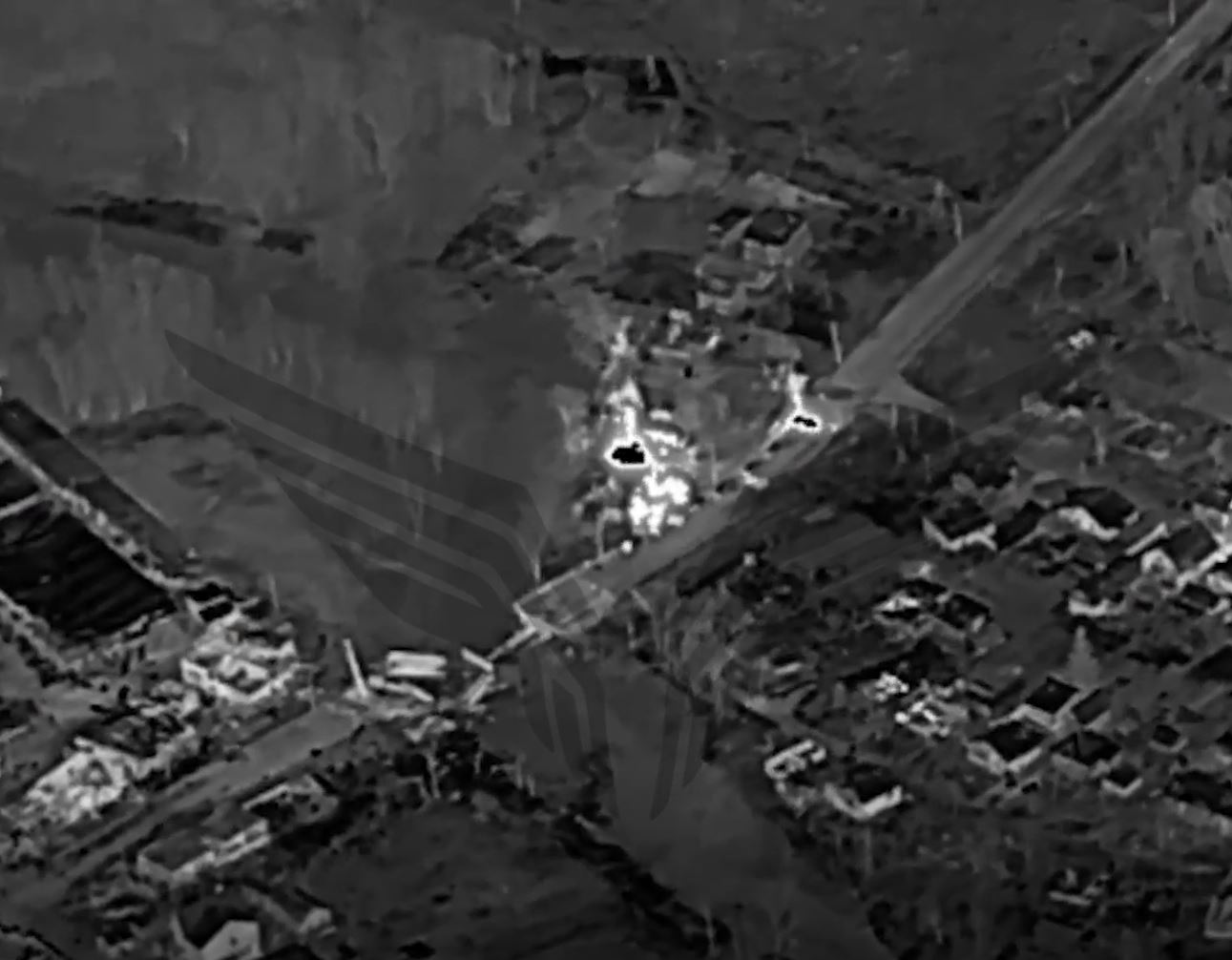 The footage seemed to show vehicles, in the centre of the image, being attacked