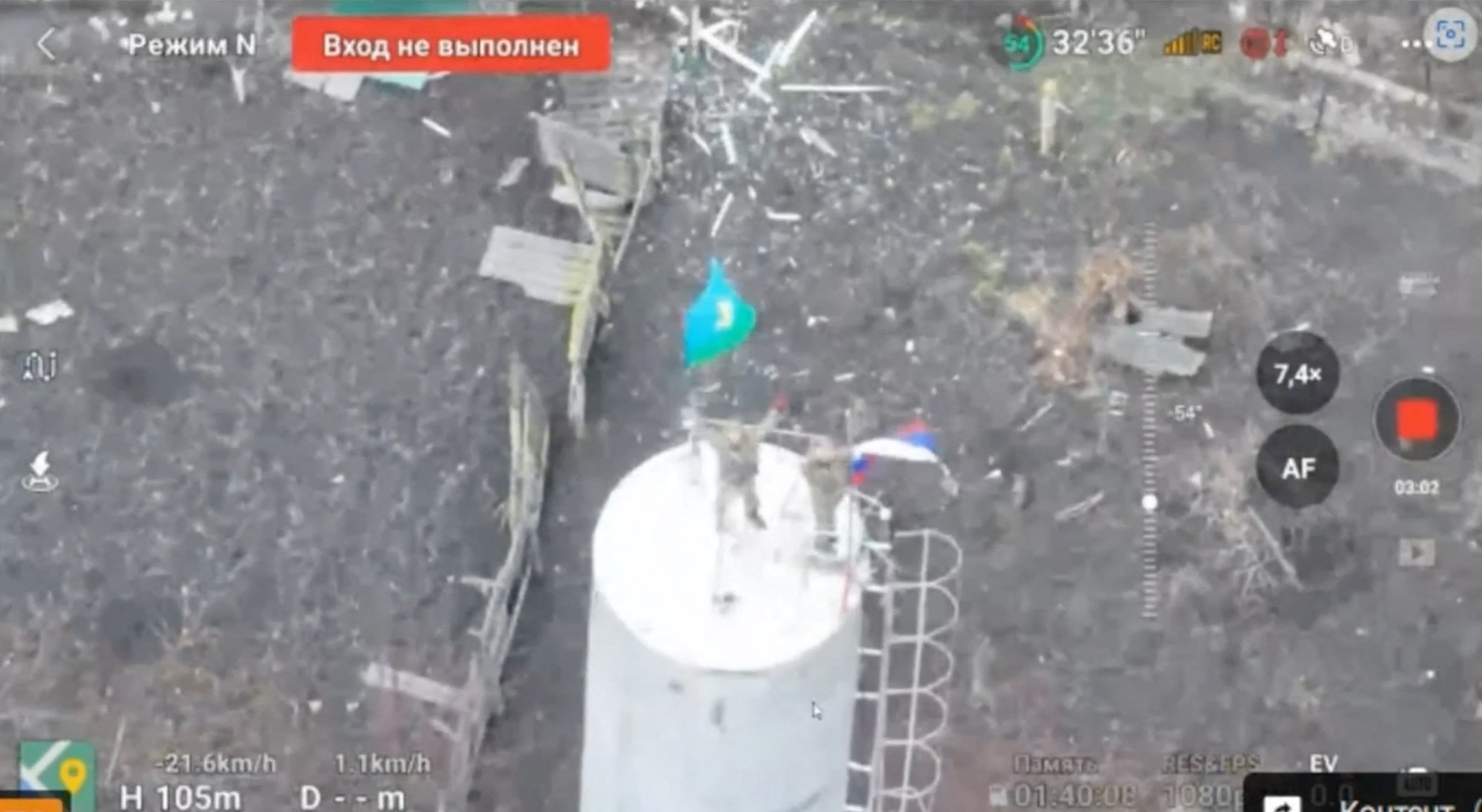 Video captured by a drone seemed to show troops flying the Russian flag from a water tower in the centre of Sudzha