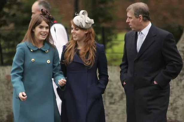 Prince Andrew with his daughters, Princess Eugenie and Princess Beatrice